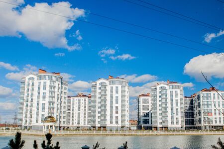 Moscow, Russia, NOVEMBER 2018. Butovo district, new building, panoramic view into the territory near the house, new houses, building, architecture, park and lake. Autumn and beautiful, cumulus clouds.のeditorial素材
