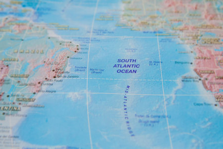South Atlantic Ocean stralia in close up on the map. Focus on the name of Ocean. Vignetting effect.の写真素材