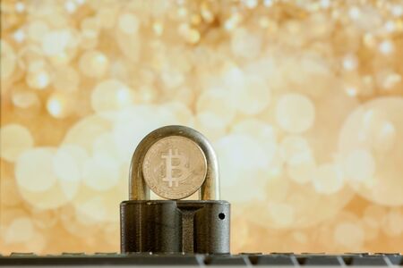 Bitcoin currency on keyboard computer on bokee background.Virtual cryptocurrency conceptの写真素材
