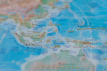 Indonesia in close up on the map. Focus on the name of country. Vignetting effect.