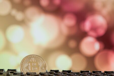 Bitcoin currency on keyboard computer on bokee background.Virtual cryptocurrency conceptの写真素材