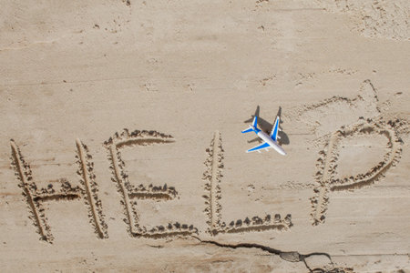 Help me the inscription and plane on the sand. Please help me. On a tropical beach.