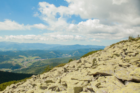 Beautiful mountain landscape, with mountain peaks covered with forest and a cloudy sky. Ukraine...