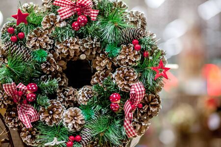 Beautiful Christmas wreath displayed on store frontの写真素材