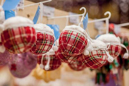 Christmas toy on the Christmas tree. New Year decoration. Decorated shop window.の写真素材