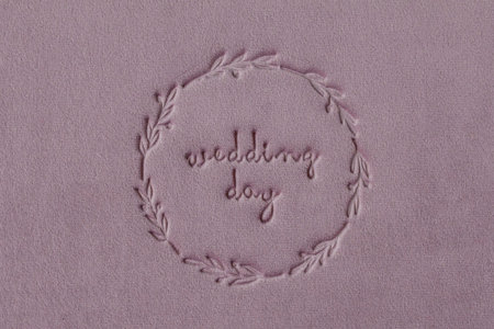 Inscription WEDDING DAY supplanted on velour wedding book