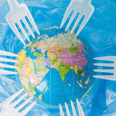 Globe on a plastic plate. The concept of ecology, land conservation.