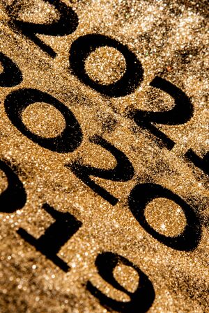 Beautiful sparkling Golden Numbers of 2019 to 2020 on black background for design, happy new year concept.の写真素材