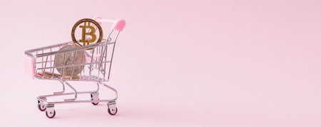 a cart from a supermarket, bitcoin on a wooden background. internet, crypto currency.の写真素材