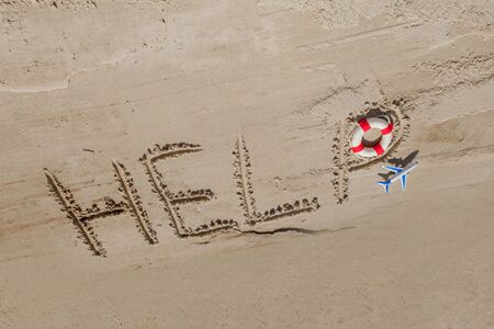 Help me the inscription on the sand. Please help me. On a tropical beach.の写真素材