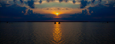 Beautiful summer sunset in the lake Svityaz. Sunset Background.