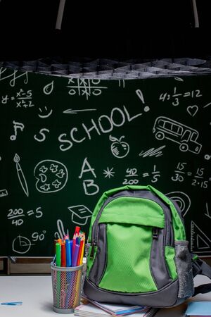 Shooting of school supplies for product promotion in photo studio. Photo production backstage. Photo content creation, Photo creation industry.の写真素材