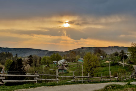 Beautiful summer landscape at sunset. Village near of of Carpathian, Ukraine, Europe