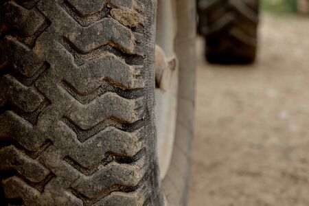 Detail of an old, cracked tractor tire.の写真素材
