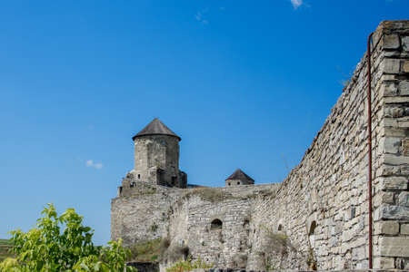 August 12, 2020 Kamenets Podolsk: Scenic summer view of ancient fortress castle in Kamianets-Podilskyi, Khmelnytskyi Region, Ukraine. Kamyanets-Podilsky a romantic city on the background of a beautiful sky with clouds.のeditorial素材
