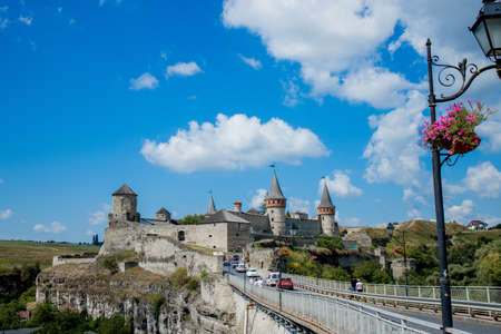 August 12, 2020 Kamenets Podolsk: Scenic summer view of ancient fortress castle in Kamianets-Podilskyi, Khmelnytskyi Region, Ukraine. Kamyanets-Podilsky a romantic city on the background of a beautiful sky with clouds.のeditorial素材