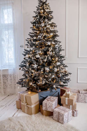 Presents and Gifts under Christmas Tree, Winter Holiday Concept.の写真素材