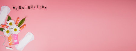 Womans comfort and hygienic protection, menstruation, sanitary pads on pink background. Critical...