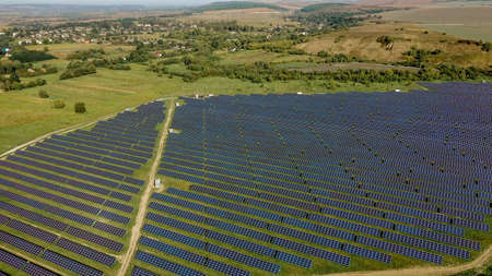 Solar panels in aerial view. poSolar panels in aerial view. power farm producing clean energy.wer farm producing clean energyの写真素材