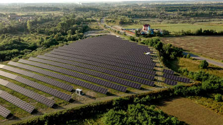 Solar panels in aerial view. poSolar panels in aerial view. power farm producing clean energy.wer farm producing clean energyの写真素材