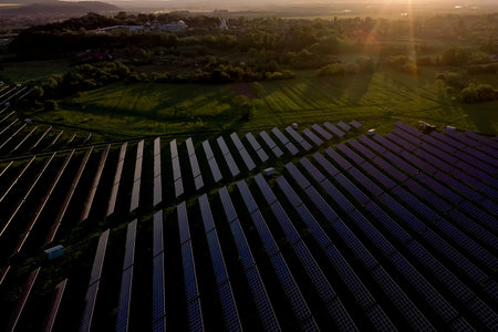 Ecology solar power station panels in the fields green energy at sunset landscape electrical...