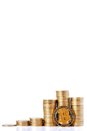 Histograma of coins and bitcoin isolated on the white background. Concept of currency growth, savings.の写真素材
