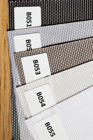 Catalog of different shades of fabric colors. Variety of color of dense fabric. Color palette.