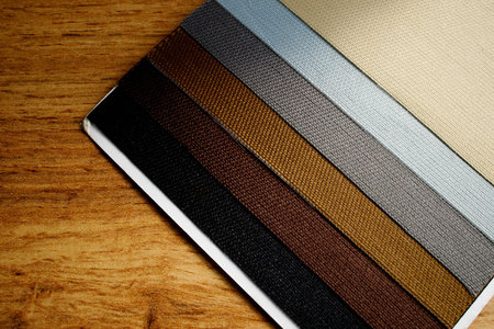 Catalog of different shades of fabric colors. Variety of color of dense fabric. Color palette.