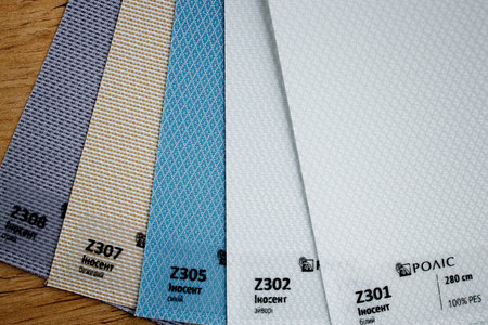 Catalog of different shades of fabric colors. Variety of color of dense fabric. Color palette.