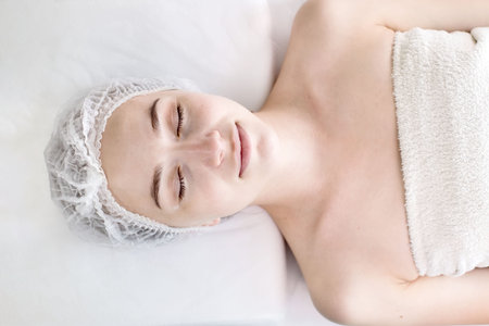Woman in moisturizing anti-wrinkle mask. A woman is lying down, resting in a beauty salon. SPA...