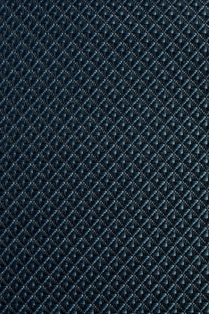 Close-up of diamond-patterned textured synthetic fabric used to make blinds. Design template or...