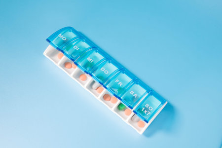 Plastic container for storing pills. Organization of storage of tablets for each day.の写真素材