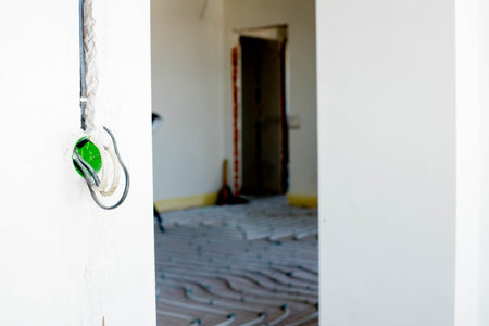 New wiring in plastic box and electrical cables for future wall sockets, repair concept. electrical wiringの写真素材