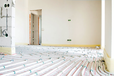 Installation of underfloor heating pipes for water heating. Heating systems. Pipes for underfloor heatingの写真素材