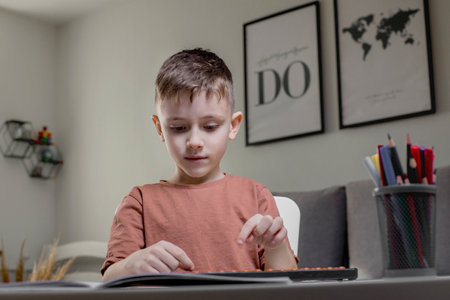 Little boy counting with the help of mental arithmetic. Mathematics in pleasure.の写真素材