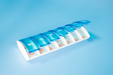 Plastic container for storing pills. Organization of storage of tablets for each day.の写真素材