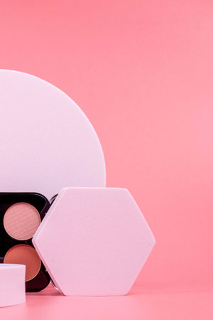 Beauty background with facial cosmetic products with empty copy space. Makeup, skincare concept with pastel colored background.の写真素材