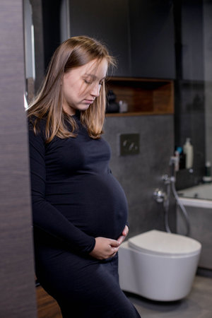 woman with big abdomen in the toilet have problems with chronic constipation, lazy bowel syndrome, and Digestive system concept.の写真素材