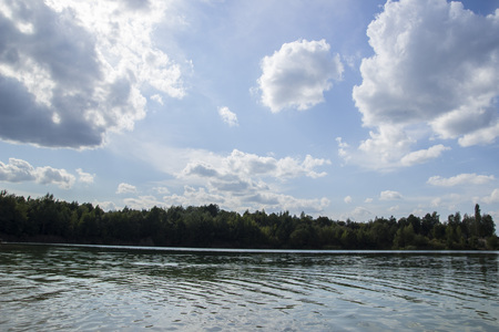 Lake in Woods. Pure lake in the forest. Beautiful sky. Reflectionの写真素材
