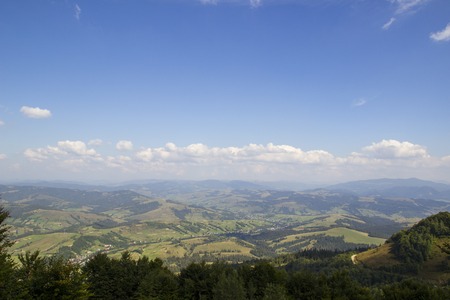 Beautiful mountains landscape in Carpathian. Wide panorama of green mountain hills. Carpathian mountains in summer. Ukrainian Carpathianの写真素材
