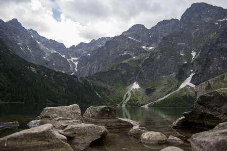 Reflection of Tatra mountain peaks in Morskie Oko lake. Eye of the Sea lake in Tatra mountains, Poland. Polish Tatra mountains Morskie Oko. Tatra mountains. Crystal clear water. Europe.の写真素材