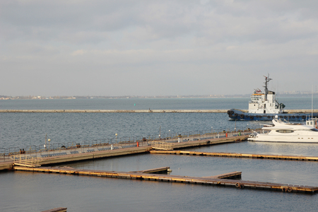 Small private yachts pier in winter Pier with rows of small private yachtsの写真素材