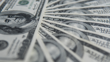 One hundred dollars pile. Money background, heap of dollars, financial concept of earnings. Top view. Financial, bussiness, commercial and banking concept. American dollars in one hundred banknotes.の写真素材