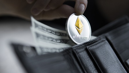 Ethereum coin and hundred dollars bills in leather wallet. Ethereum with dollar in purse. Profit from mining crypto currencies. Miner with dollars and gold Ethereum money. Bussiness, commercial.の写真素材