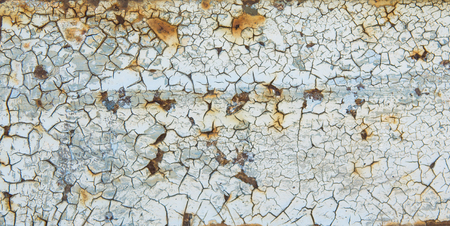 Heavy erosion metal texture faded blue color, abstract grunge background. Weathered rust metal texture background with erosion surface.の写真素材