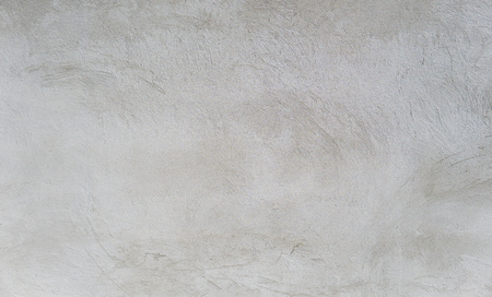 white concrete wall texture. cement material on a wall shoot with a daylight.の写真素材