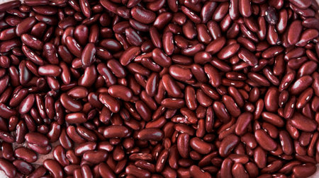 Close up red beans background and as a texture. Healthy vegetarian dietary food rich in...