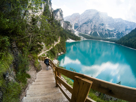 Amazing view of Braies Lake. Lago di Braies with summer forest and mountains reflected in surface...