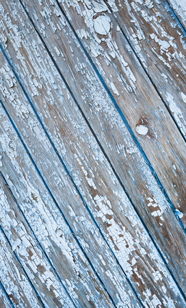 Old painted texture vintage wood background with peeling paint. Painted weathered plain teal blue and white Rustic Wood Board Back ground that can be either horizontal or vertical.の写真素材