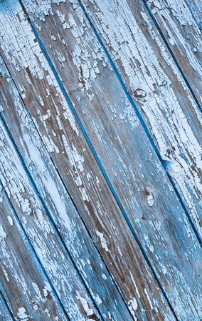 Old painted texture vintage wood background with peeling paint. Painted weathered plain teal blue and white Rustic Wood Board Back ground that can be either horizontal or vertical.の写真素材